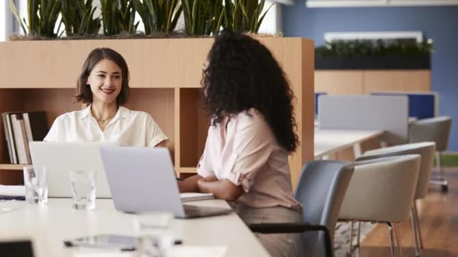 Woman and boss talking